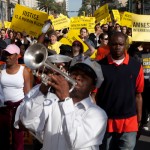 Activists & Second Line musicians rally to city hall